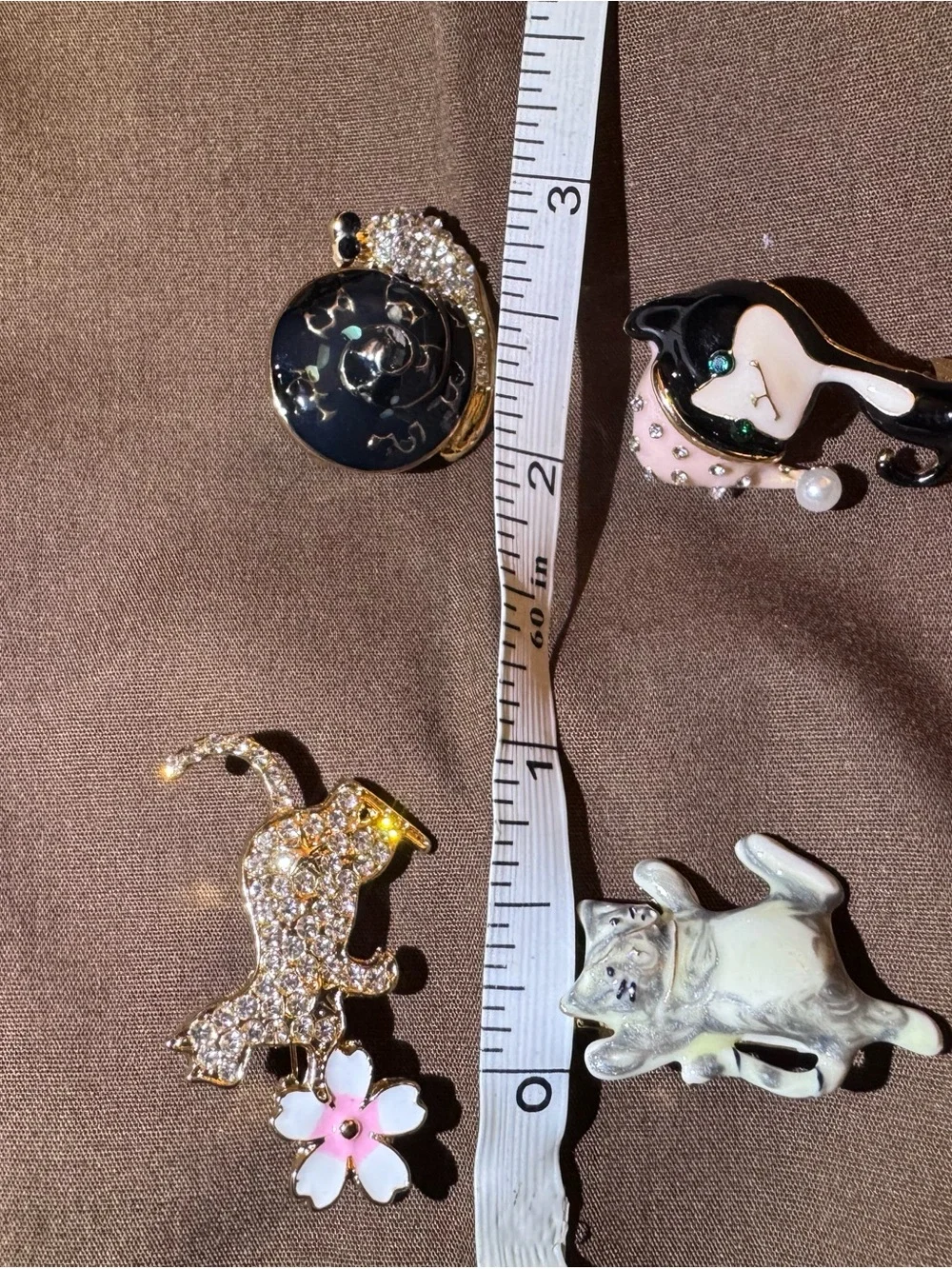 Rhinestone Cat Brooch with Pink Flower Accent